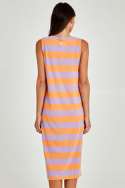 Model Madeline wearing size 10 of the Horizon Tank Dress in colour Papayaprwi (Purple), from the back