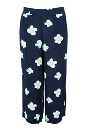 Product shot of the Juno Floral Pant in colour Navyjuno (Blue), from the front