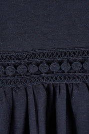 Product shot of the Market Dress in colour Black (Black), detail