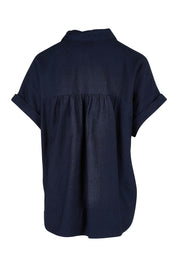 Product shot of the Clem Shirt in colour Navy (Blue), from the back