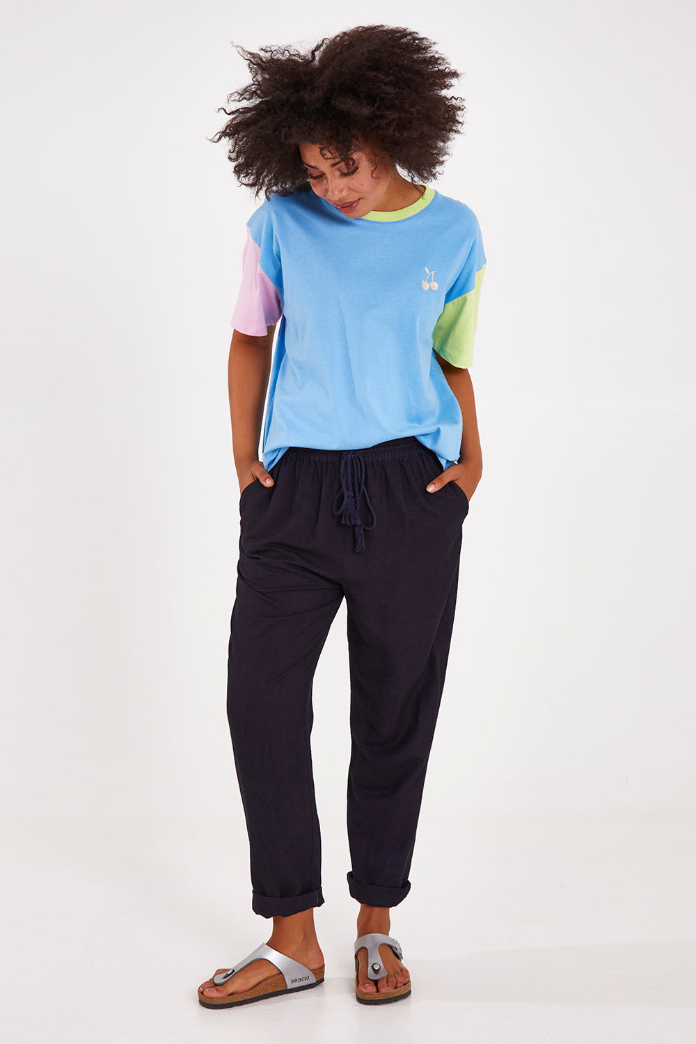 Model Olivia wearing size 10 of the Clem Relaxed Linen Blend Pant in colour Dksapphire (Blue), from the front, showing the whole outfit
