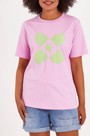 Model Olivia wearing size 10 of the Crossed Tee in colour Sweetlilac (Purple), from the front, cropped image
