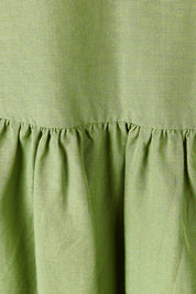 Product shot of the River Dress in colour Junglegrn (Green), detail