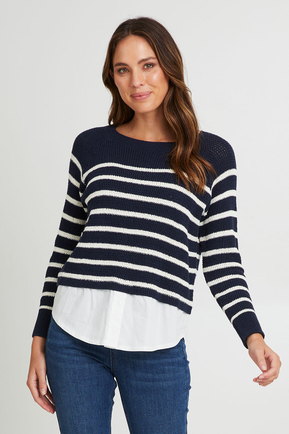 Model Madeline wearing size S of the Fawn Combo Knit in colour Drksapp (Blue), from the front, cropped image