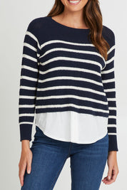 Model Madeline wearing size S of the Fawn Combo Knit in colour Drksapp (Blue), from the front, cropped image
