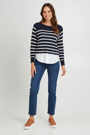 Model Madeline wearing size S of the Fawn Combo Knit in colour Drksapp (Blue), from the front, showing the whole outfit