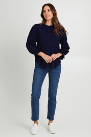 Model Madeline wearing size 10 of the Fennel Shirt in colour Navy (Blue), from the front, showing the whole outfit