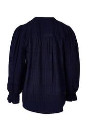 Product shot of the Fennel Shirt in colour Navy (Blue), from the back