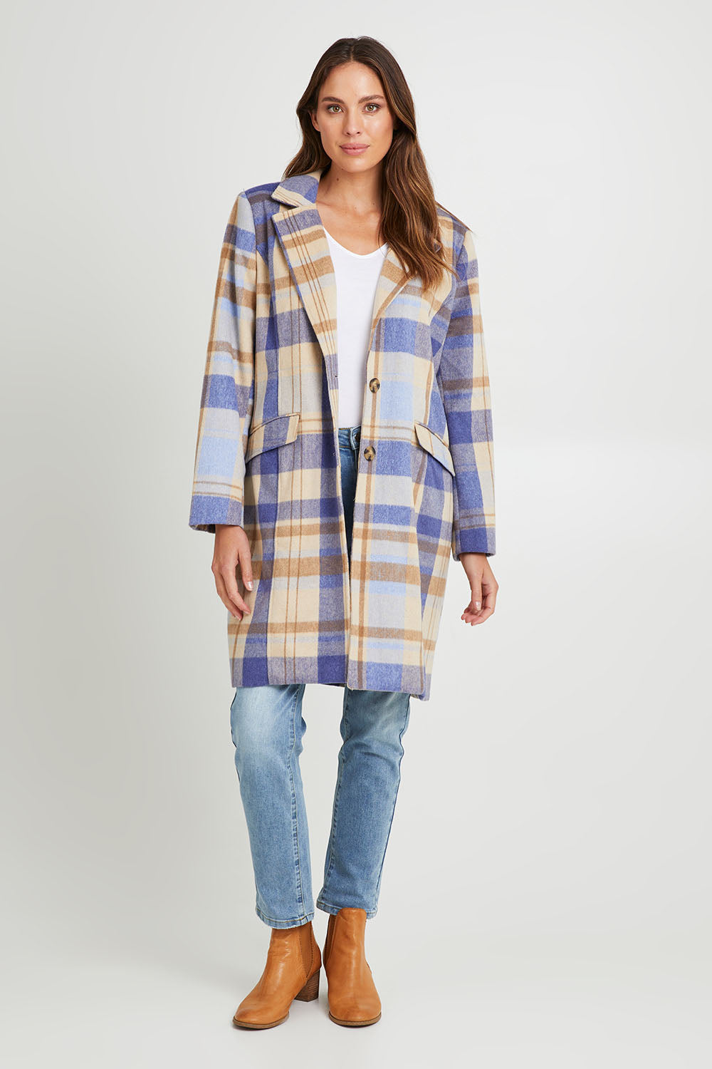Model Madeline wearing size S of the Cove Check Coat in colour Navyhydra (Blue), from the front, showing the whole outfit