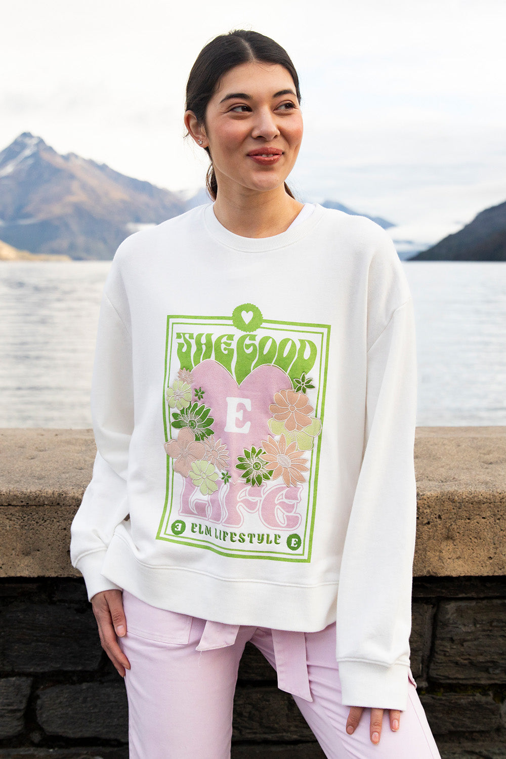 A model wearing the Good Life Crew in colour Pearl (White), from the front, cropped image
