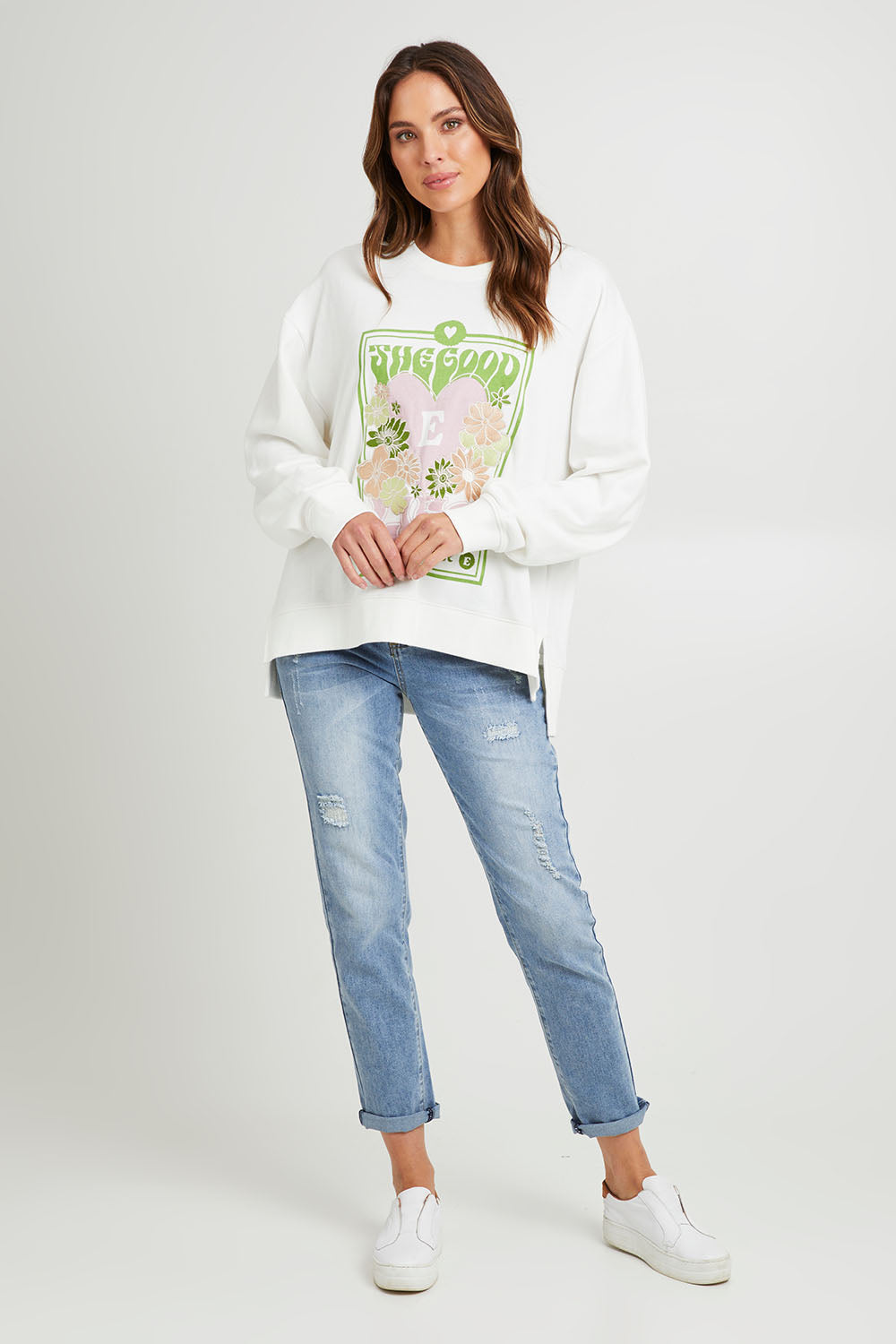 Model Madeline wearing size 10 of the Good Life Crew in colour Pearl (White), from the front, showing the whole outfit