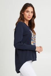 Model Madeline wearing size 10 of the Panorama Crew in colour Drksapp (Blue), from the front, cropped image