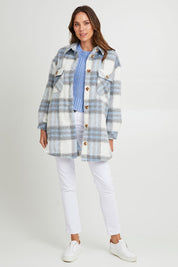 Model Madeline wearing size S of the Victory Check Shacket in colour Check (White), from the front, showing the whole outfit