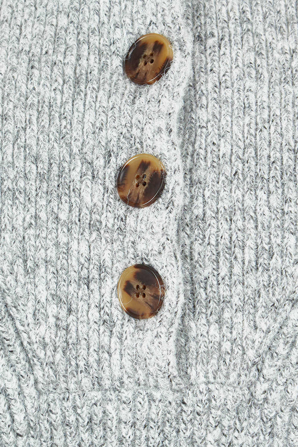 Product shot of the Bron Button Knit in colour Greymarle (Grey), detail