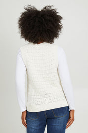 Model Olivia wearing size S of the Janey Knit Vest in colour Pearl (White), from the back