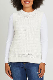 Model Olivia wearing size S of the Janey Knit Vest in colour Pearl (White), from the front, cropped image