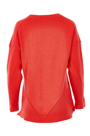 Product shot of the Ember Knit in colour EmberGlow, from the back