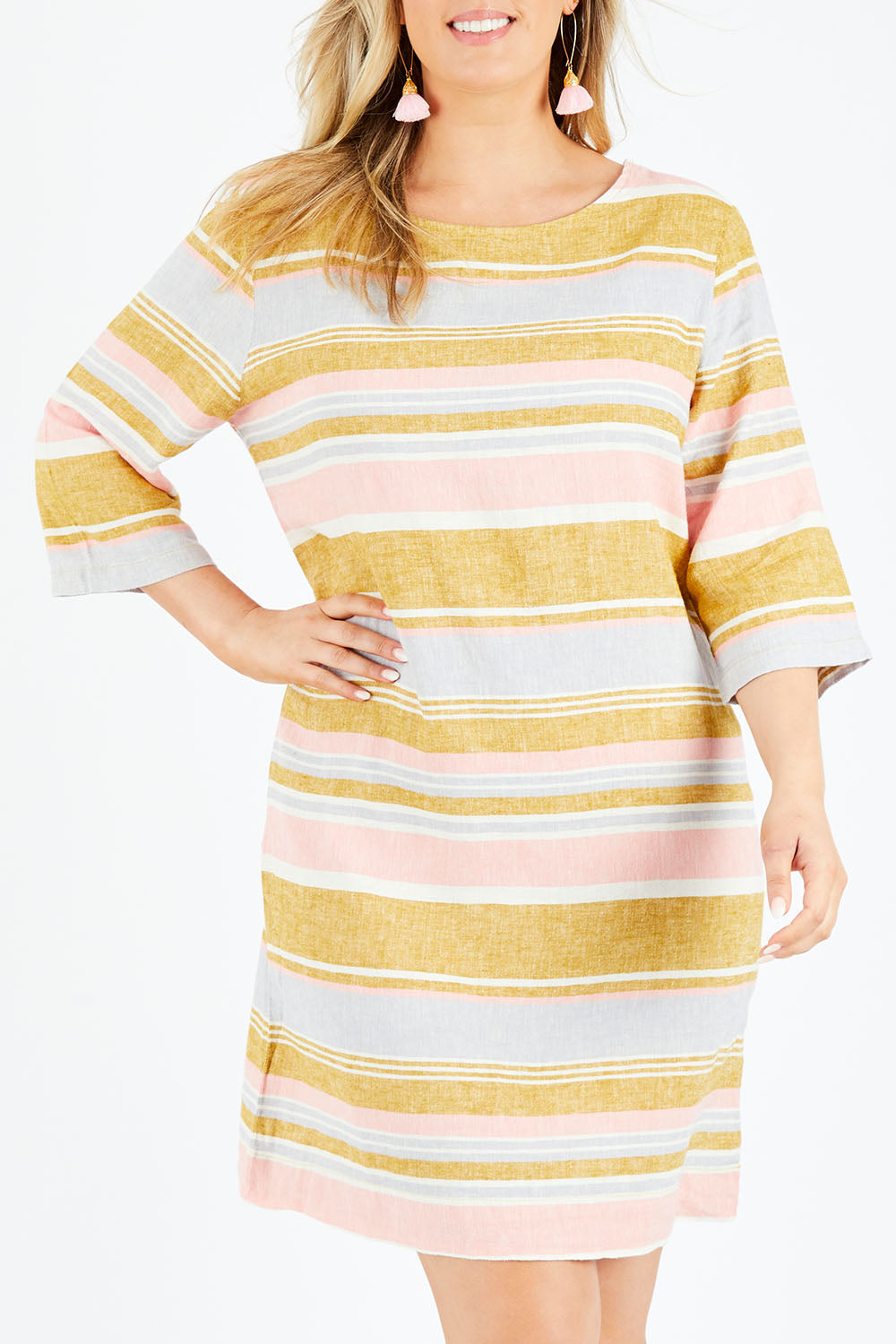Model Jess wearing size 14 of the Juniper Stripe Dress in colour Multistrip (Pink), from the front, cropped image