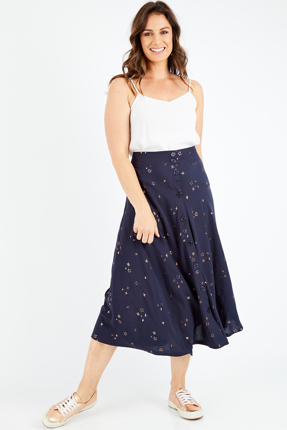 Model Shadae wearing size 10 of the Celestial Skirt in colour Navy (Blue), from the front, showing the whole outfit