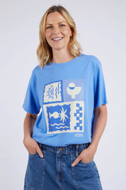 A model wearing the Holiday Sun Tee in colour Cerulean (Blue), from the front, cropped image