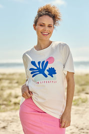 Model Lala wearing size 10 of the Art House Cotton Tee in colour Marshmello (White), from the front, showing the whole outfit