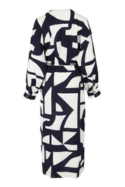 Product shot of the Dali Abstract Dress in colour Midnight (Blue), from the back