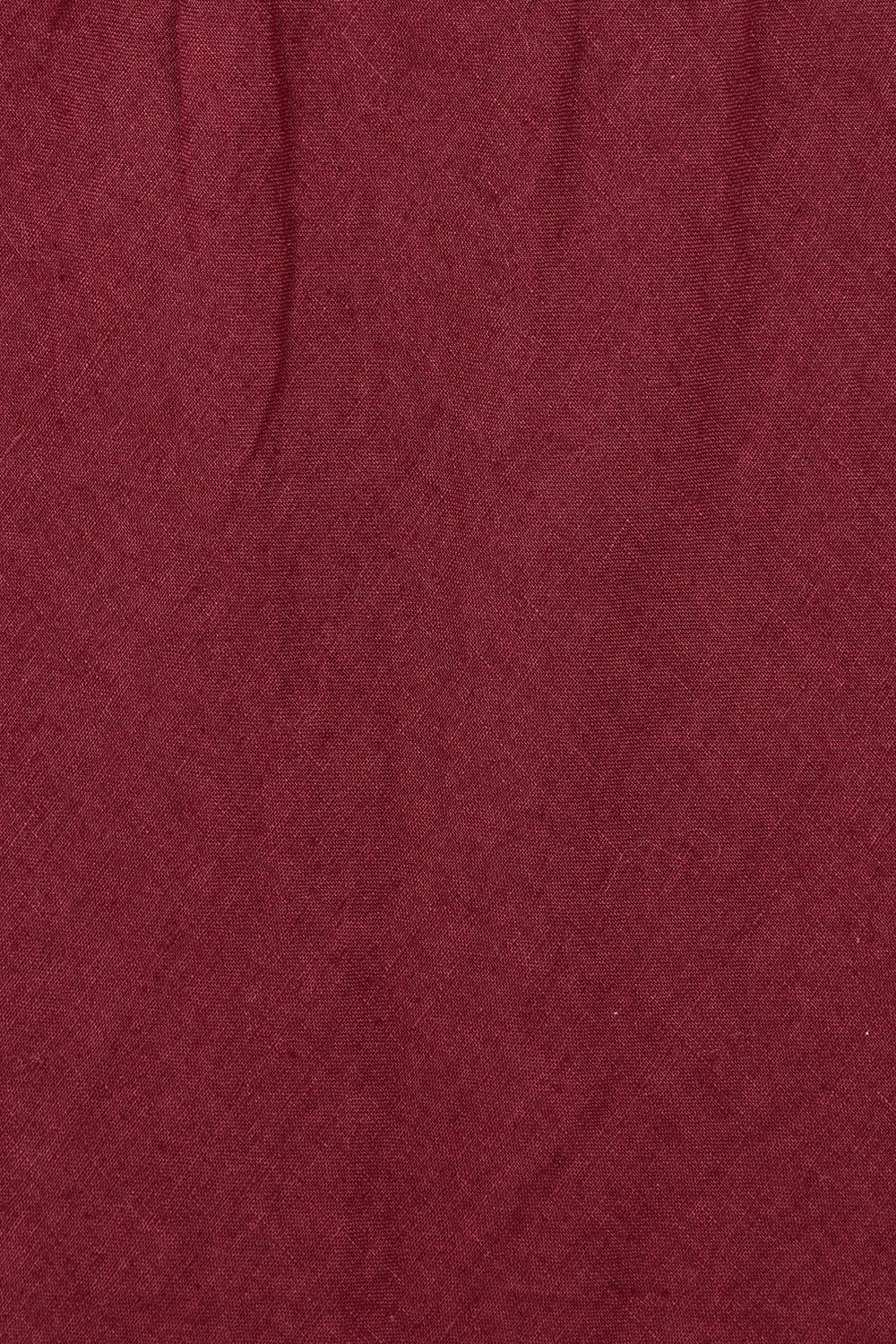Product shot of the Eleni Linen Skirt in colour Plum (Red), detail