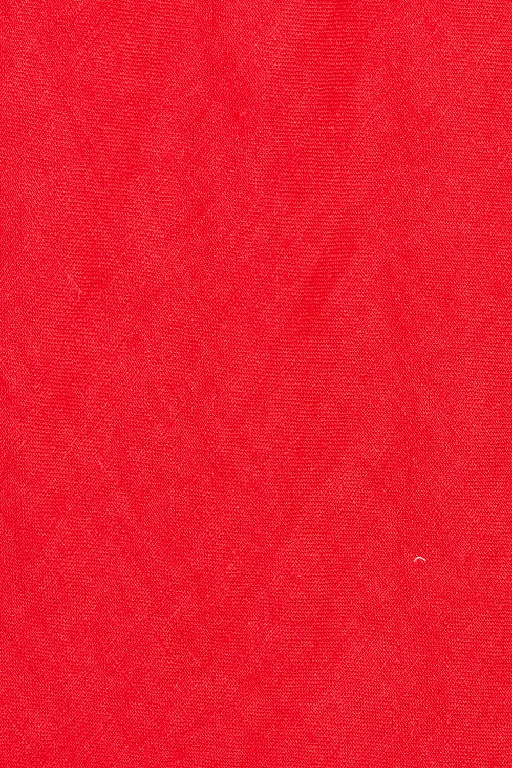 Product shot of the Eleni Linen Skirt in colour Poppy (Red), detail