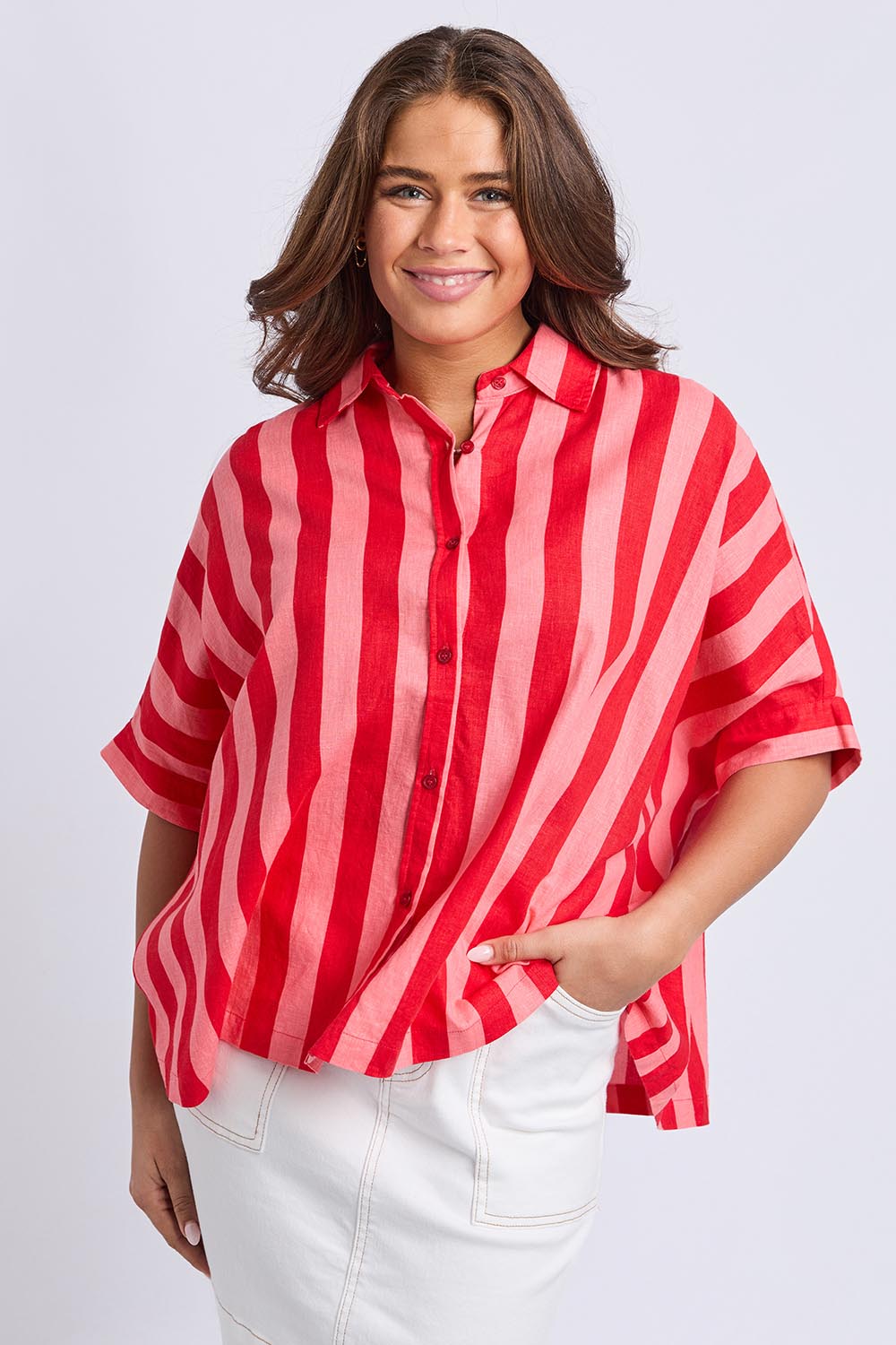 A model wearing the Palermo Linen Blend Stripe Shirt in colour Poppy, from the front, cropped image