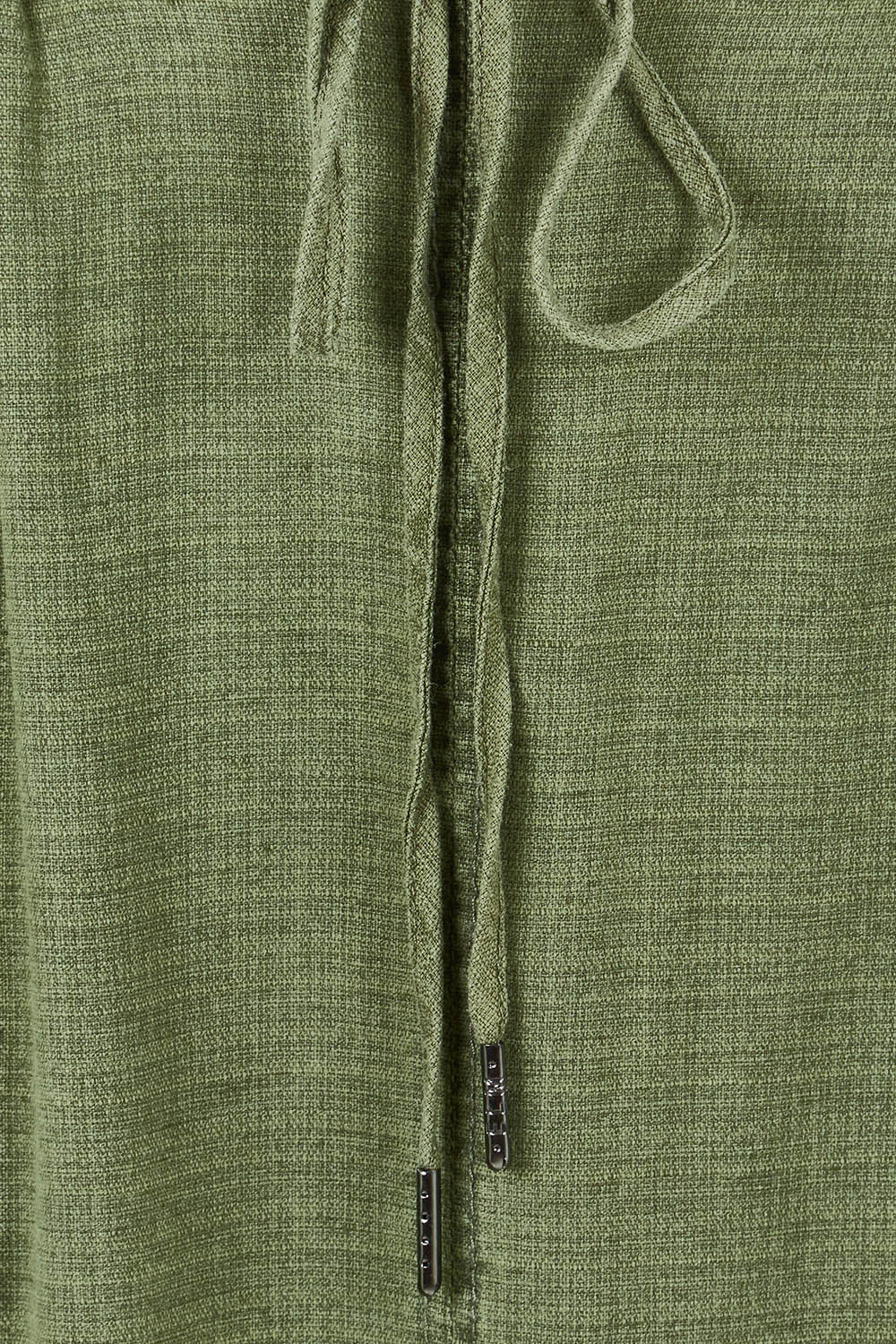 Product shot of the Mila Utility Skirt in colour Clover (Green), detail