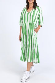 A model wearing the Spritz Stripe Linen Blend Dress in colour Greenwhite (Green), from the front, cropped image