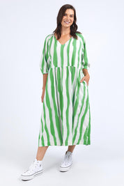 A model wearing the Spritz Stripe Linen Blend Dress in colour Greenwhite (Green), from the front, showing the whole outfit