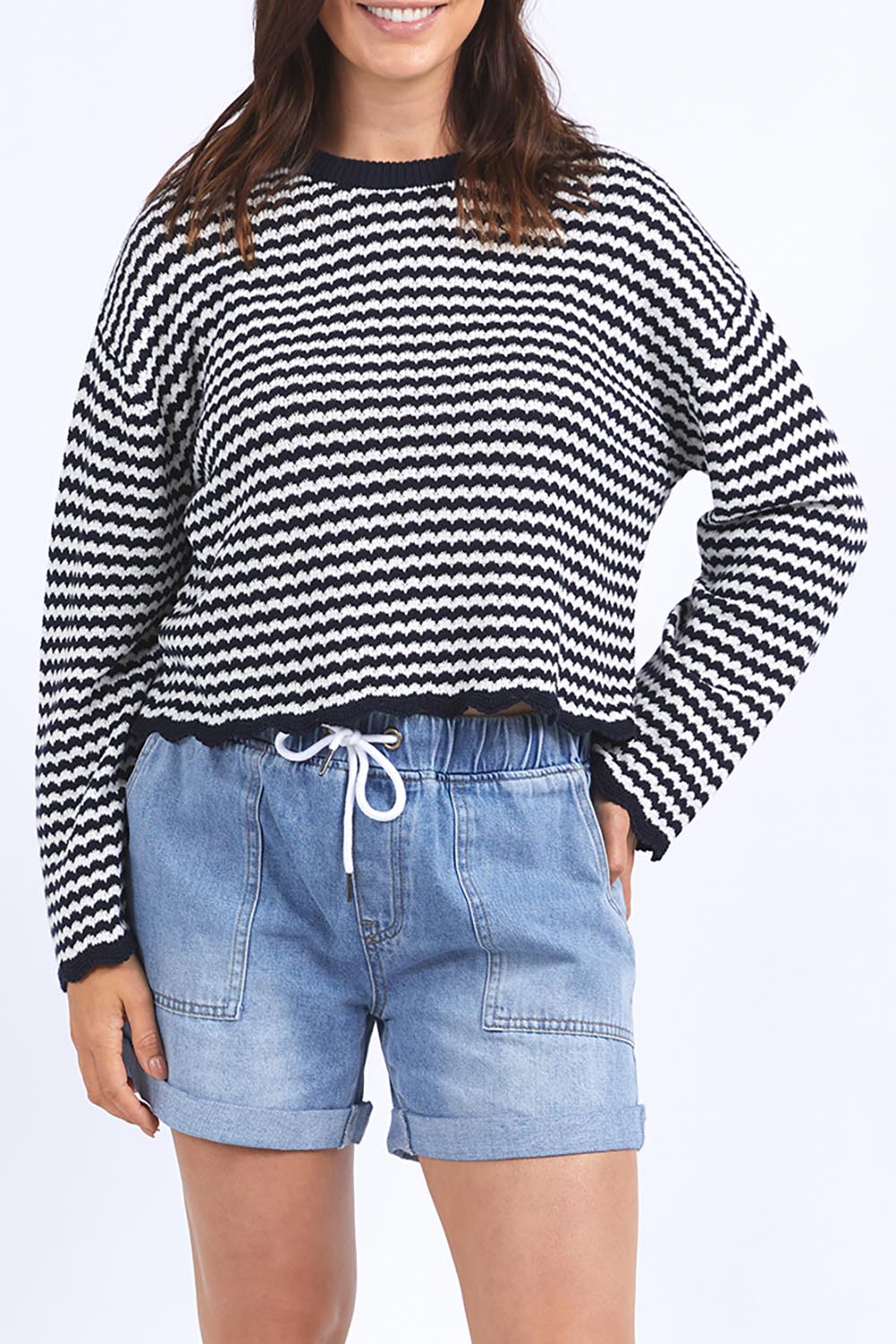 A model wearing the Rosie Stripe Cotton Knit Top in colour Navywhite, from the front, cropped image