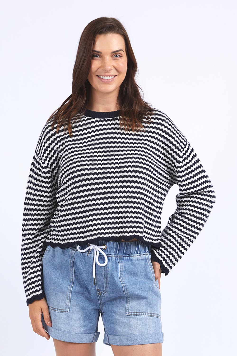 A model wearing the Rosie Stripe Cotton Knit Top in colour Navywhite, from the front, cropped image
