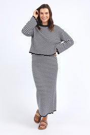 A model wearing the Rosie Stripe Cotton Knit Top in colour Navywhite, from the front, showing the whole outfit