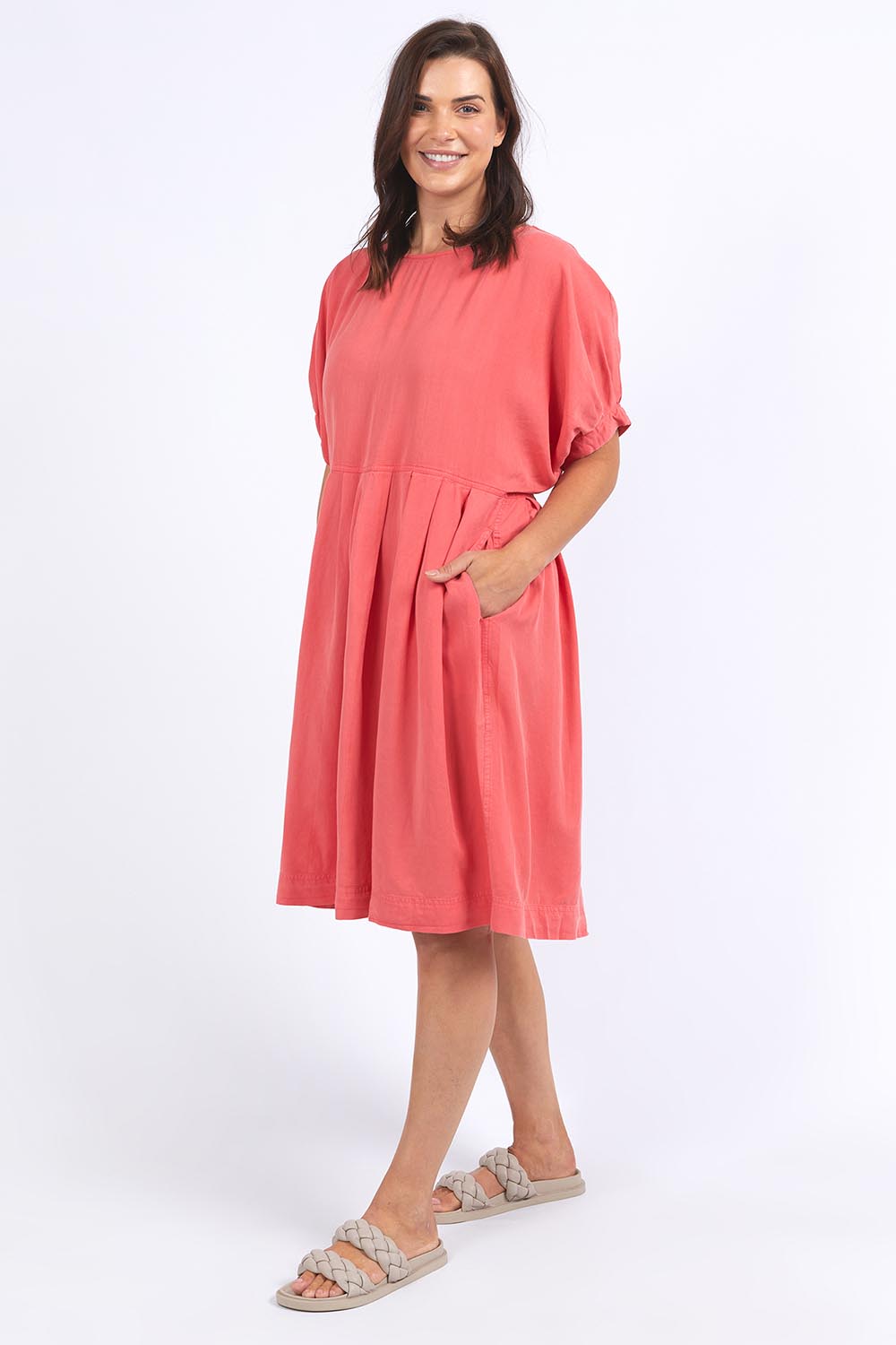 A model wearing the Bliss Relaxed Lyocell Linen Dress in colour Watermelon (Pink), from the front, showing the whole outfit