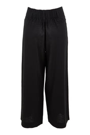 Product shot of the Wendy Pant in colour Black (Black), from the back