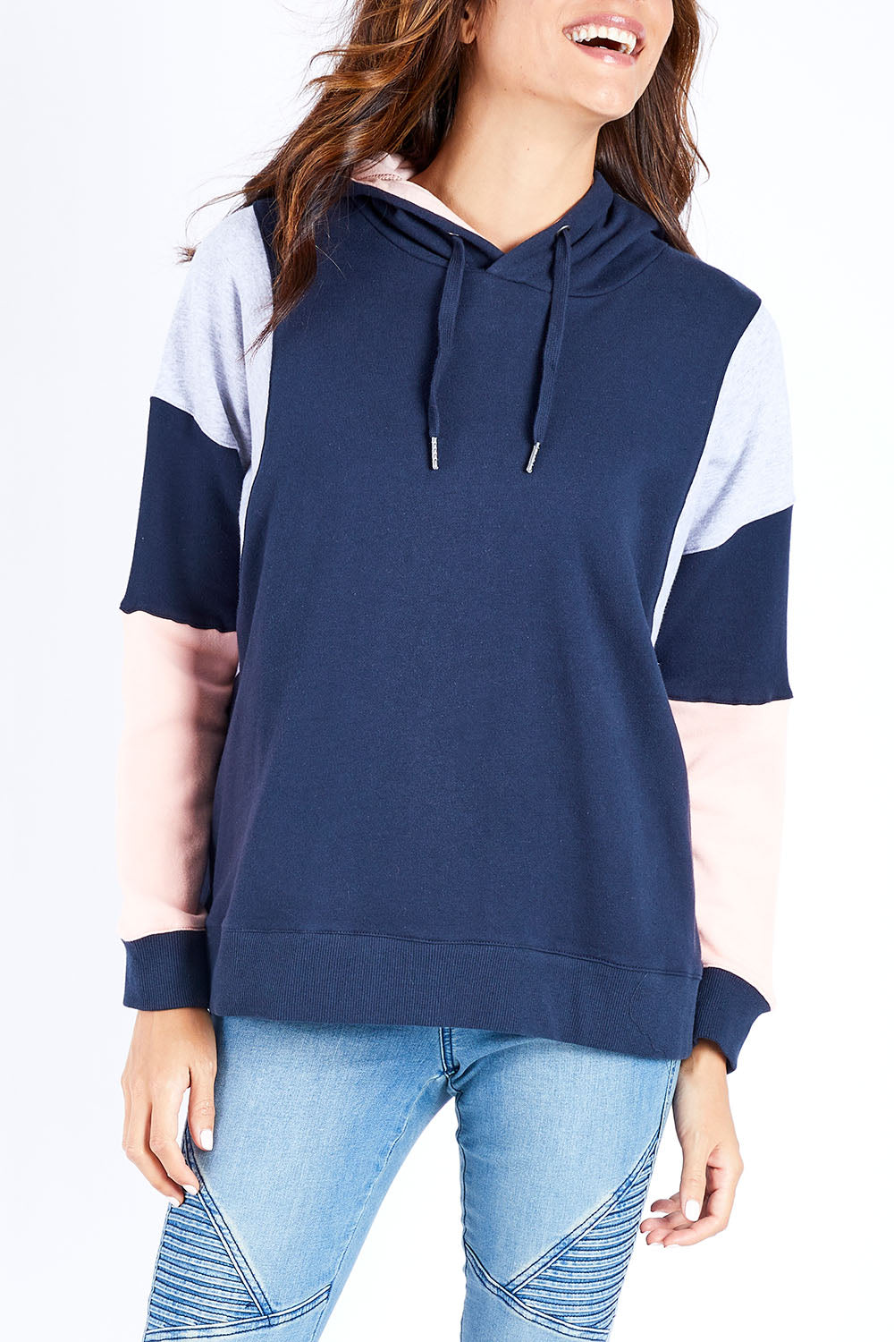 Model Ilona wearing size 10 of the Amelia Panel Hoody in colour Navycontr (Blue), from the front, cropped image
