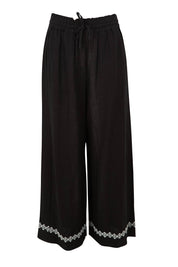 Product shot of the Nina Embroidered Pant in colour Black (Black), from the front