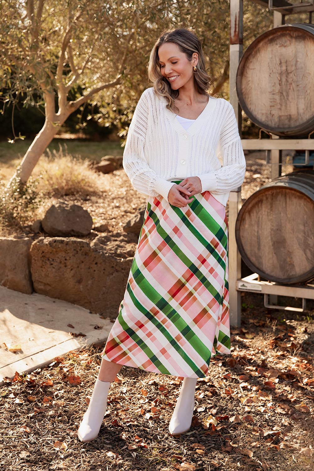 A model wearing the Bree Check Linen Blend Skirt in colour Multicheck, from the front, showing the whole outfit