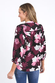 A model wearing the Hadley Floral Lyocell Linen Top in colour Hadleyprin, from the back