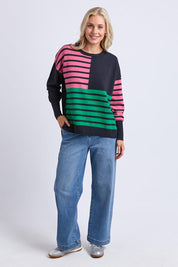A model wearing the Effie Mixed Knit in colour Pinkturq, from the front, showing the whole outfit