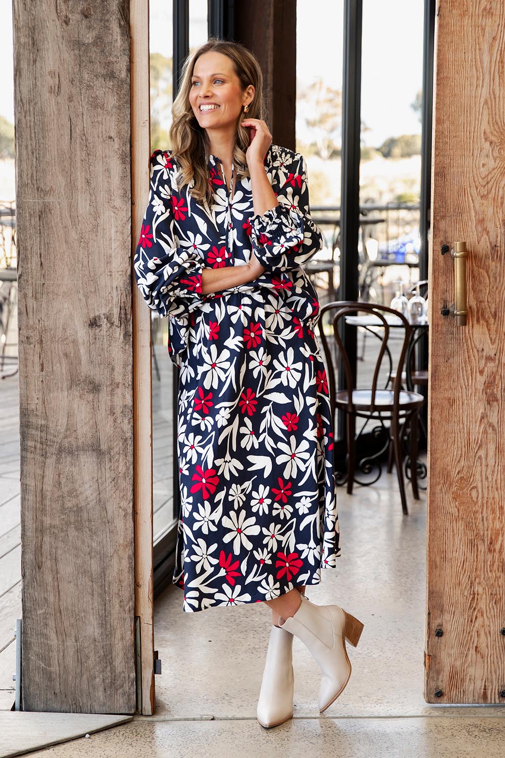 A model wearing the Indie Floral Lyocell Linen Blouse in colour Indieprint, from the front, showing the whole outfit