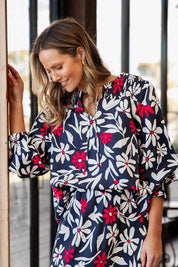 A model wearing the Indie Floral Lyocell Linen Blouse in colour Indieprint, from the front, showing the whole outfit