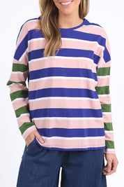 A model wearing the Ribbon Long Sleeve Cotton Tee in colour Pinkblue, from the front, cropped image