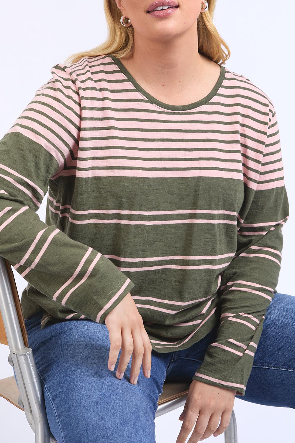 A model wearing the Lexa Stripe Long Sleeve Cotton Tee in colour Cloverpink, from the front, cropped image
