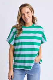 A model wearing the Poet Cotton Tee in colour Greenblue, from the front, cropped image