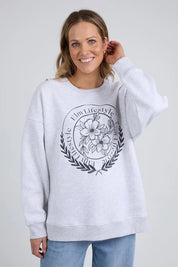 A model wearing the Emblem Cotton Crew in colour Greymarle (Grey), from the front, cropped image