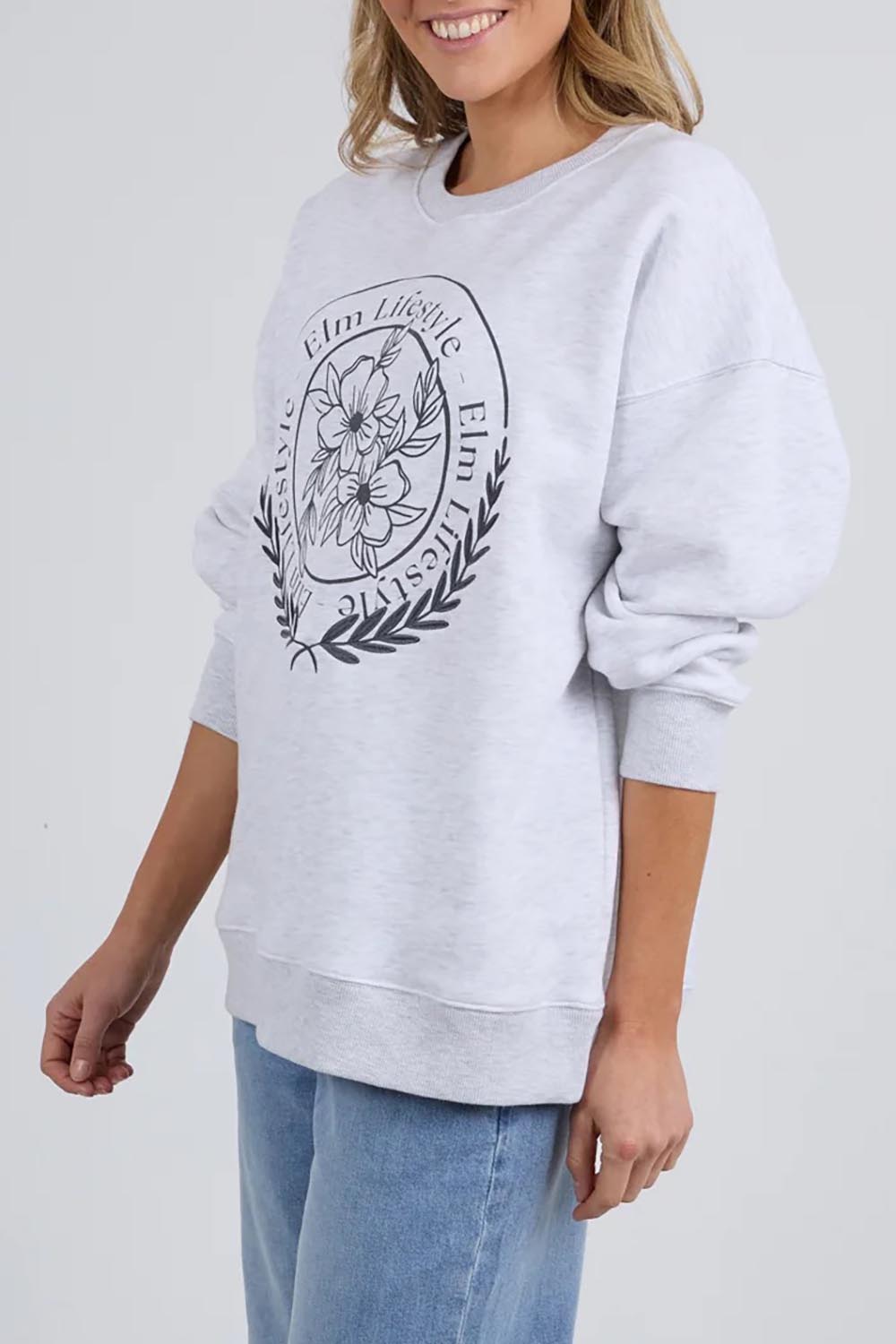 A model wearing the Emblem Cotton Crew in colour Greymarle (Grey), from the front, cropped image