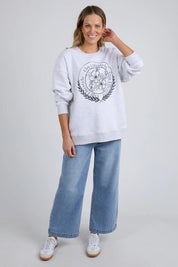 A model wearing the Emblem Cotton Crew in colour Greymarle (Grey), from the front, showing the whole outfit